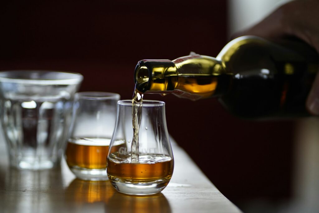whisky poured into glasses